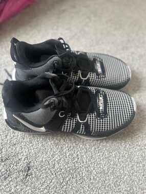 Nike woman’s Black and White Grid-Pattern Sneakers